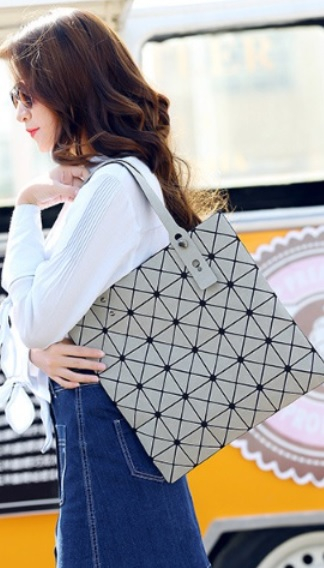 On the day of importation Glossy Lucent Cube bag 3