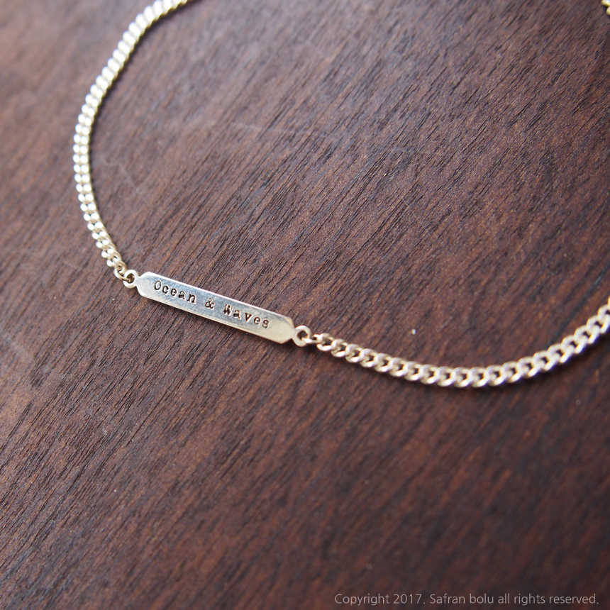 New engraved silver bracelet is custom made by an 