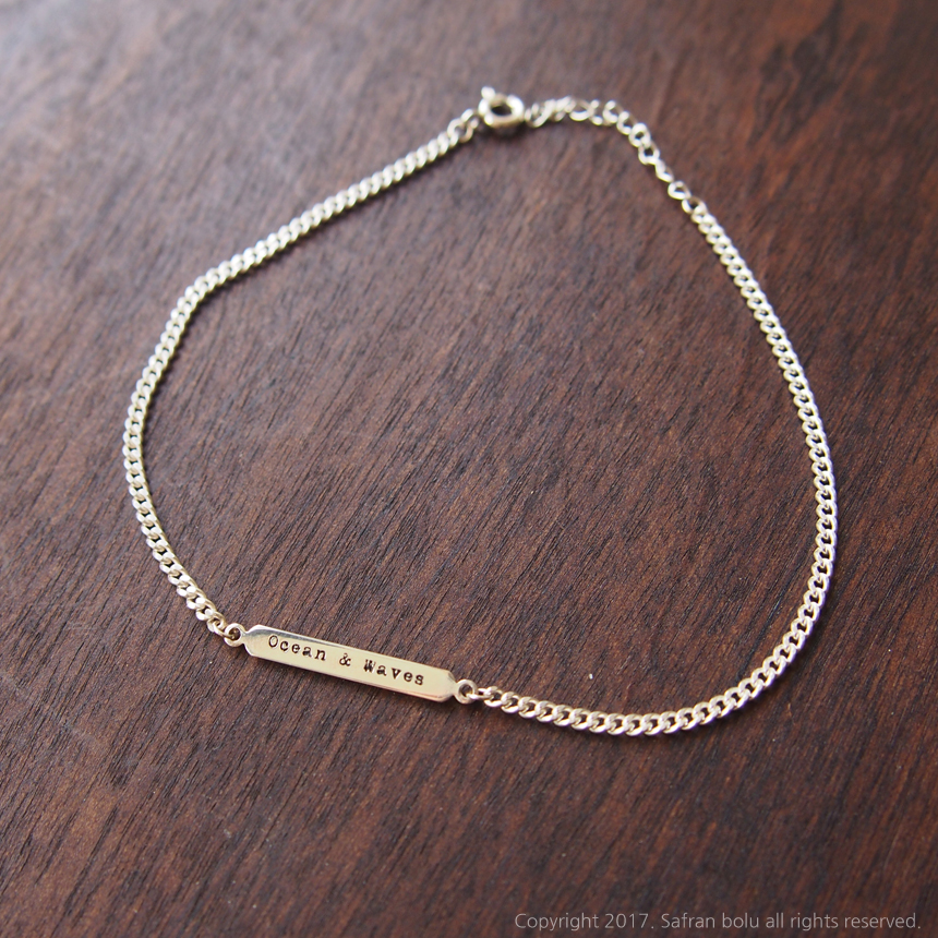 New engraved silver bracelet is custom made by an 