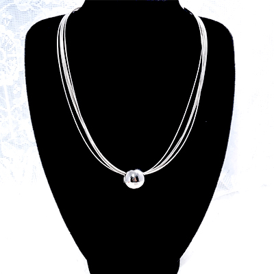 luxury shrine ball necklace. Cody Butina with Deep