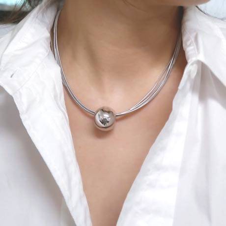 luxury shrine ball necklace. Cody Butina with Deep