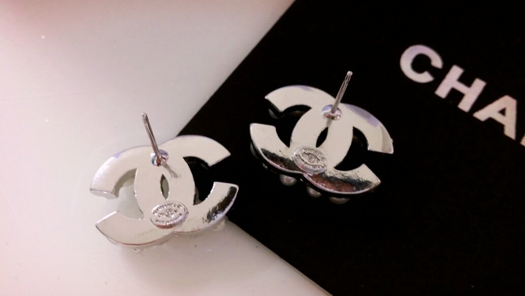 C. imported coco pearl logo earrings Sasha wedding