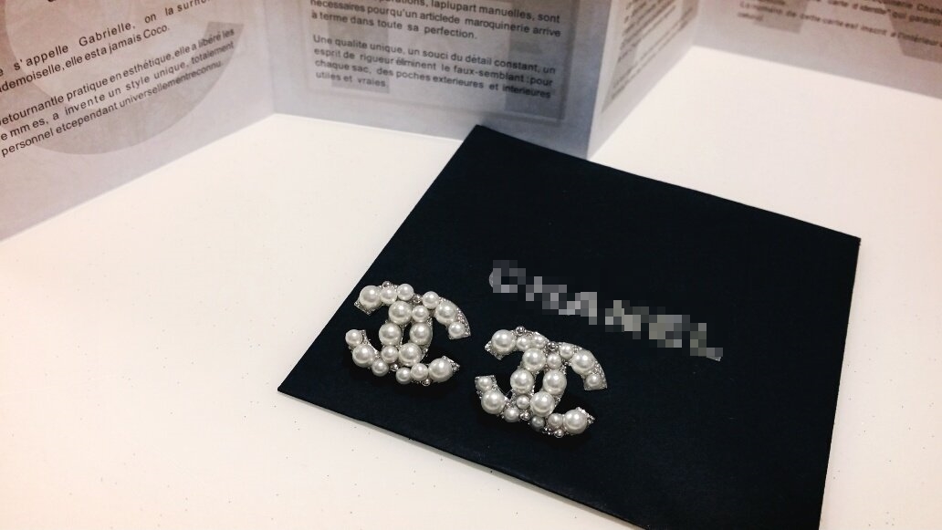 C. imported coco pearl logo earrings Sasha wedding