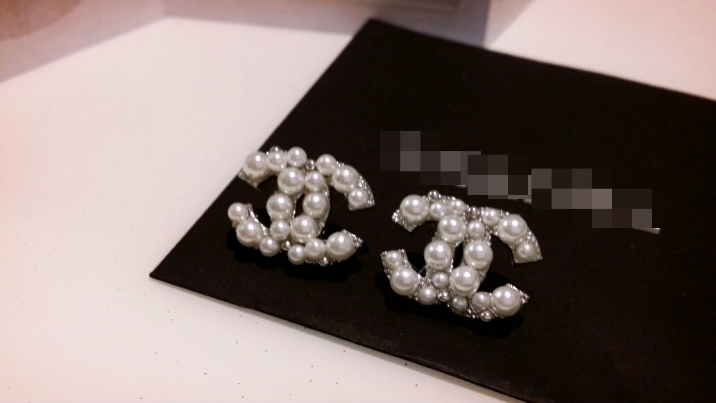 C. imported coco pearl logo earrings Sasha wedding
