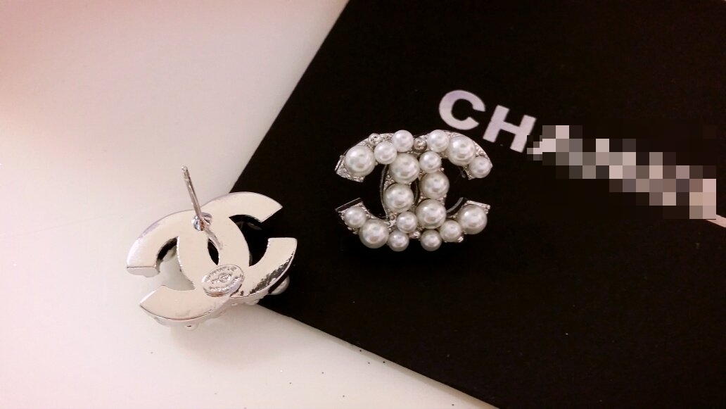 C. imported coco pearl logo earrings Sasha wedding