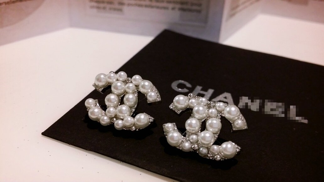 C. imported coco pearl logo earrings Sasha wedding