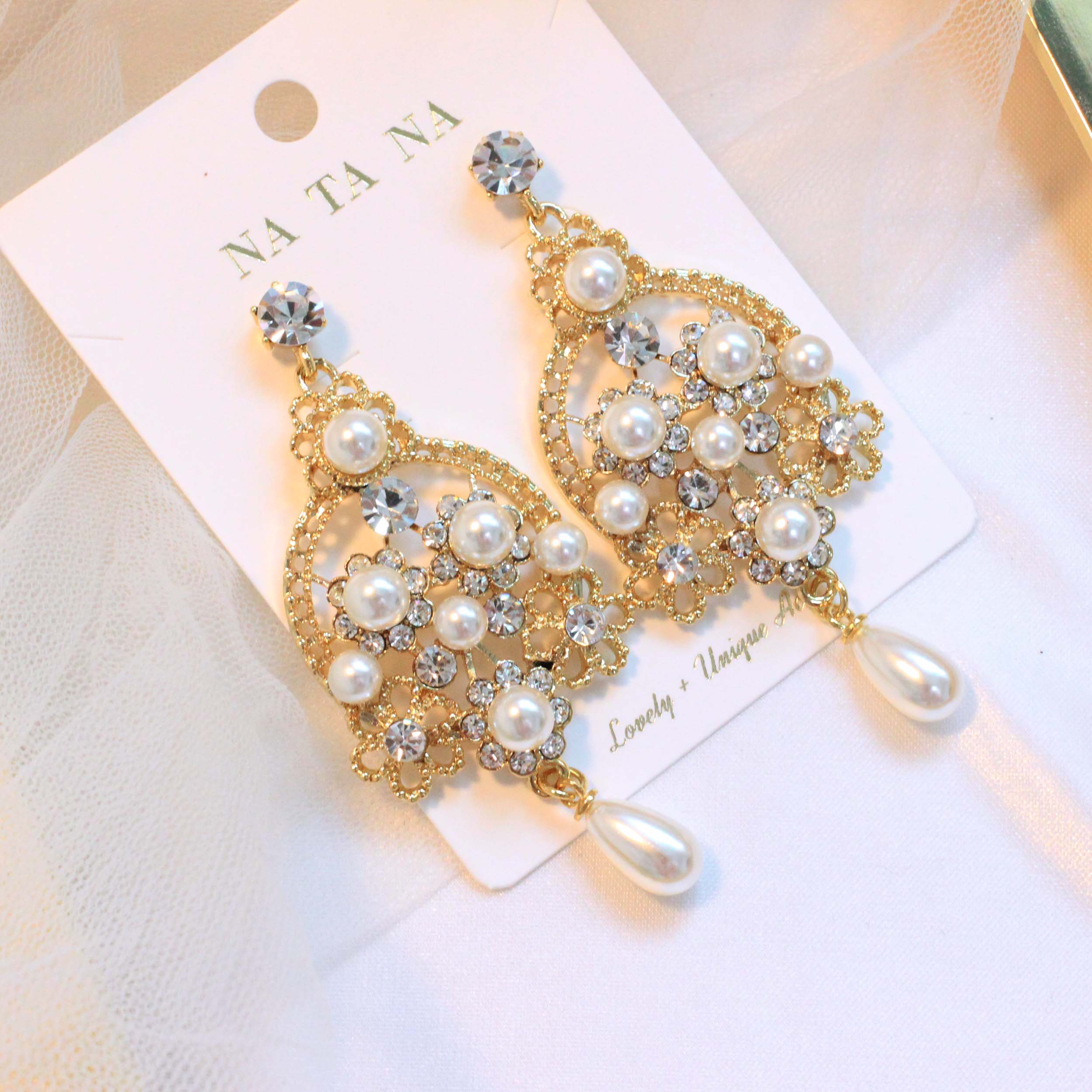 Bird pearl cubic bold drop earrings ornate titaniu