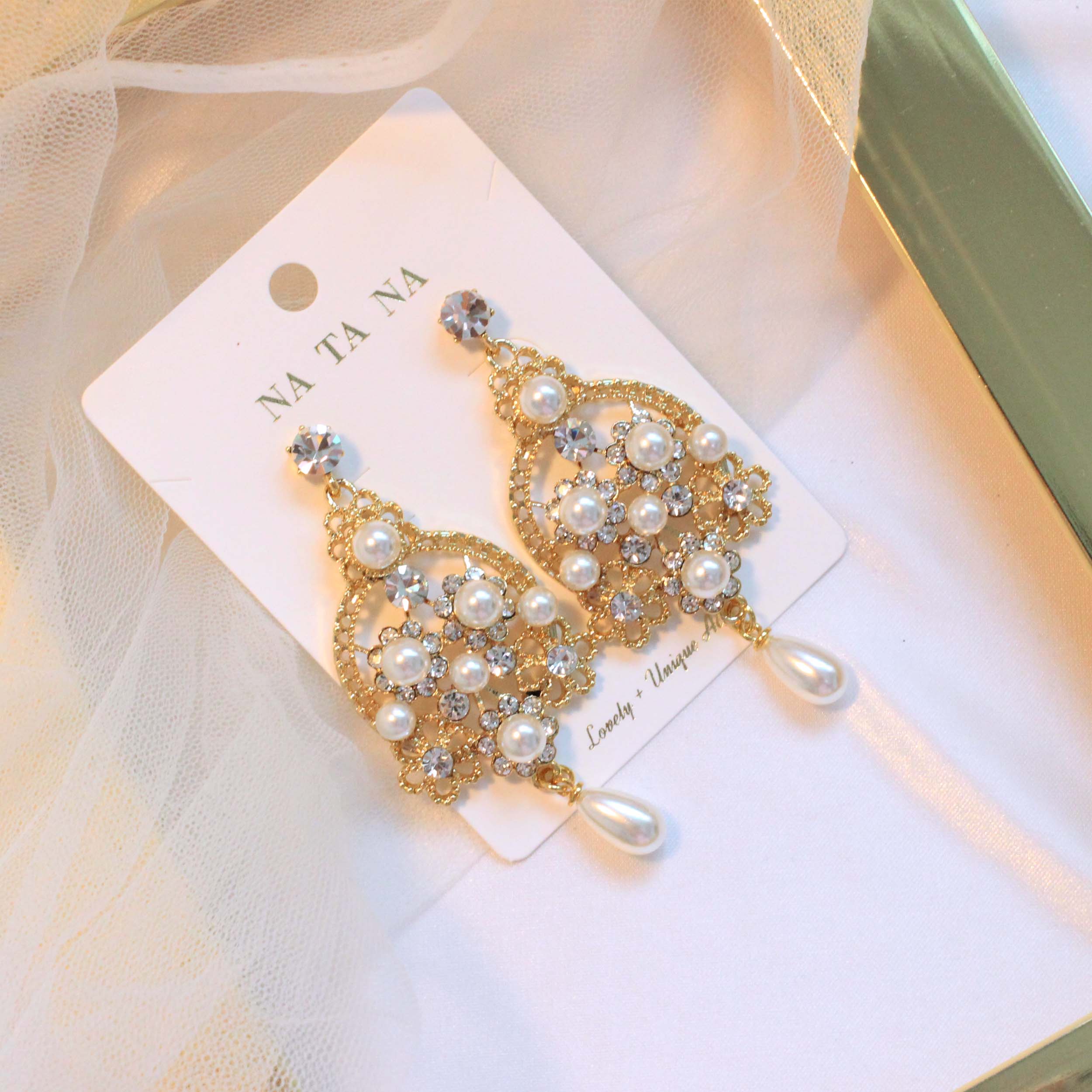 Bird pearl cubic bold drop earrings ornate titaniu