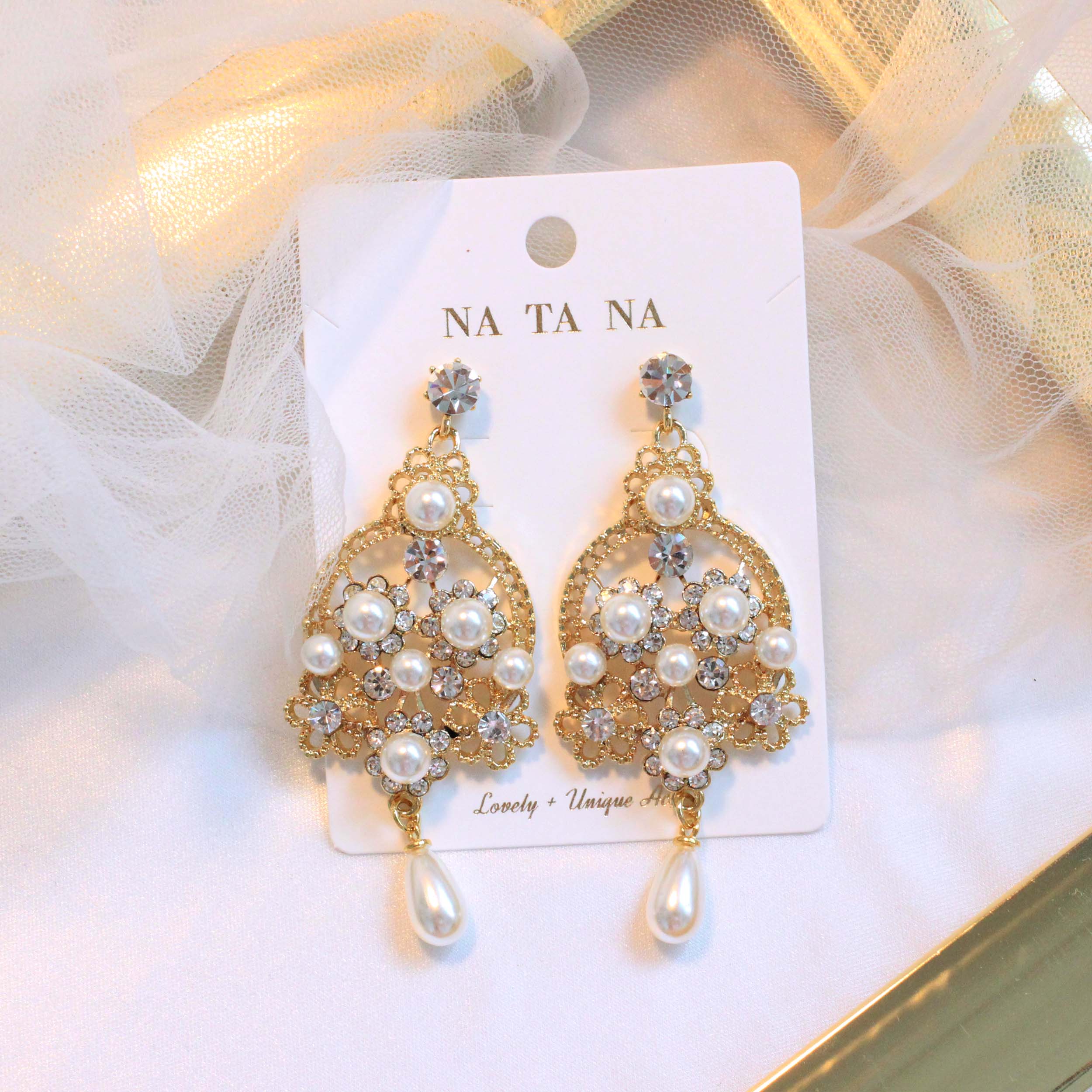Bird pearl cubic bold drop earrings ornate titaniu
