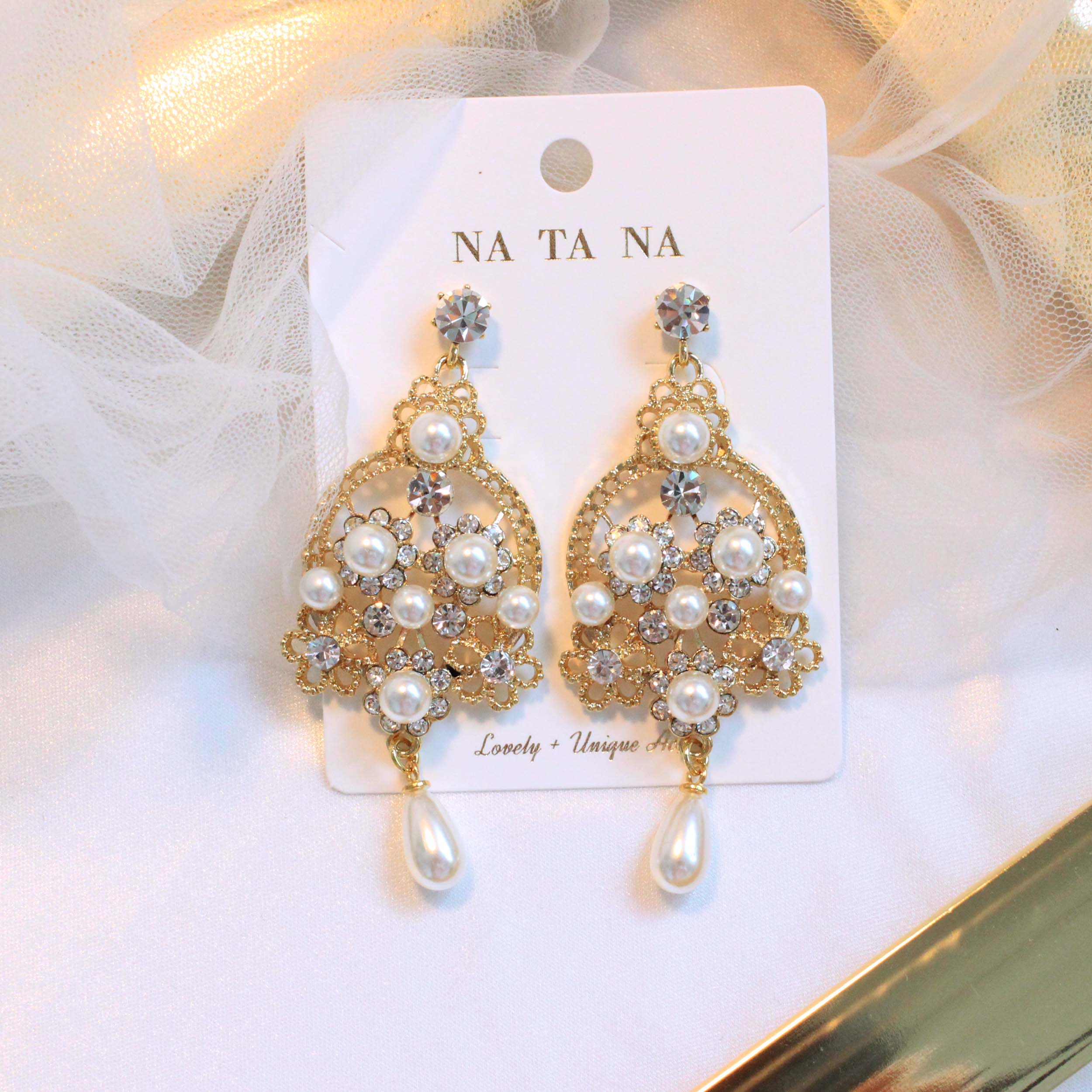 Bird pearl cubic bold drop earrings ornate titaniu