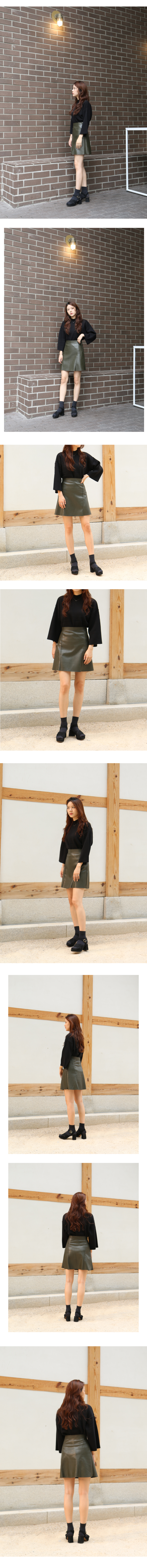 A line leather mini skirt Green, black Unique This