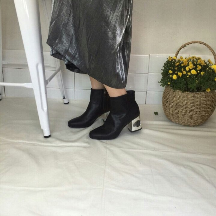 Slim metal heeled ankle boots Unique, clean and st