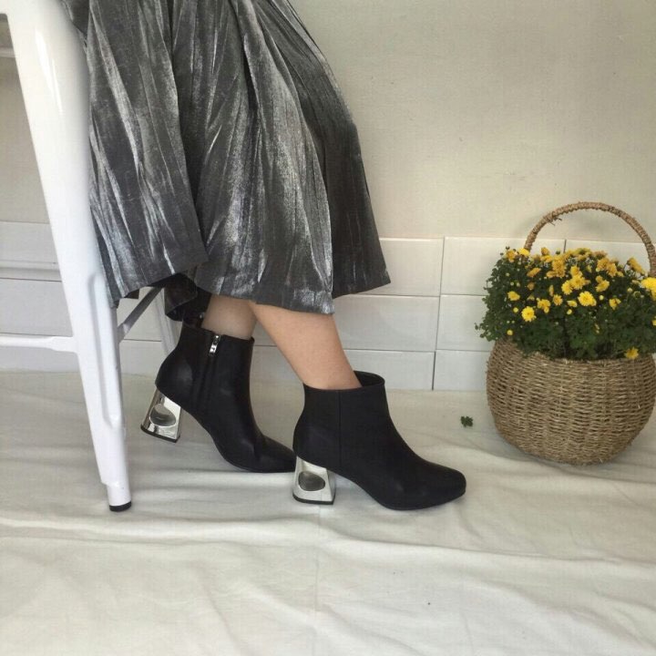 Slim metal heeled ankle boots Unique, clean and st