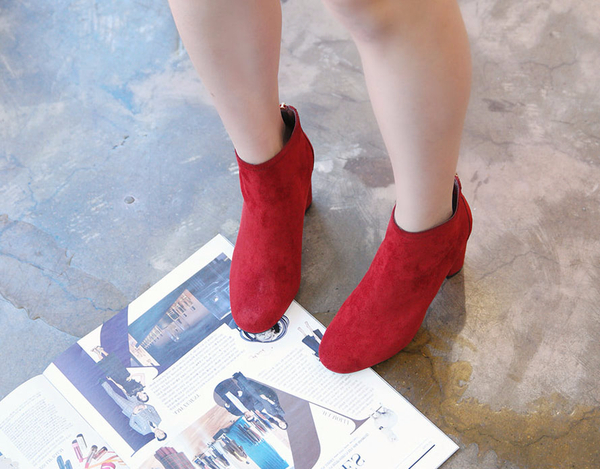 RN 7179 Suede high heel ankle boots A woman in her