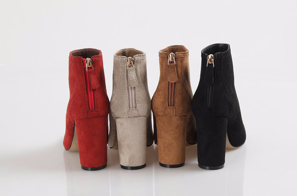 RN 7179 Suede high heel ankle boots A woman in her