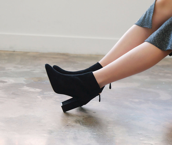 RN 7179 Suede high heel ankle boots A woman in her