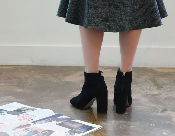 RN 7179 Suede high heel ankle boots A woman in her