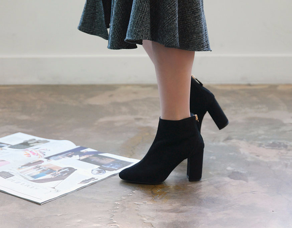 RN 7179 Suede high heel ankle boots A woman in her